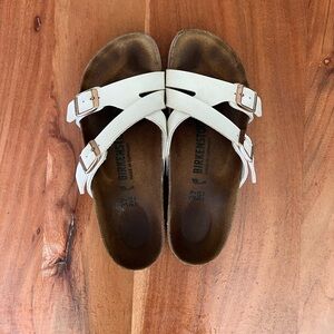 White Birkenstock sandals